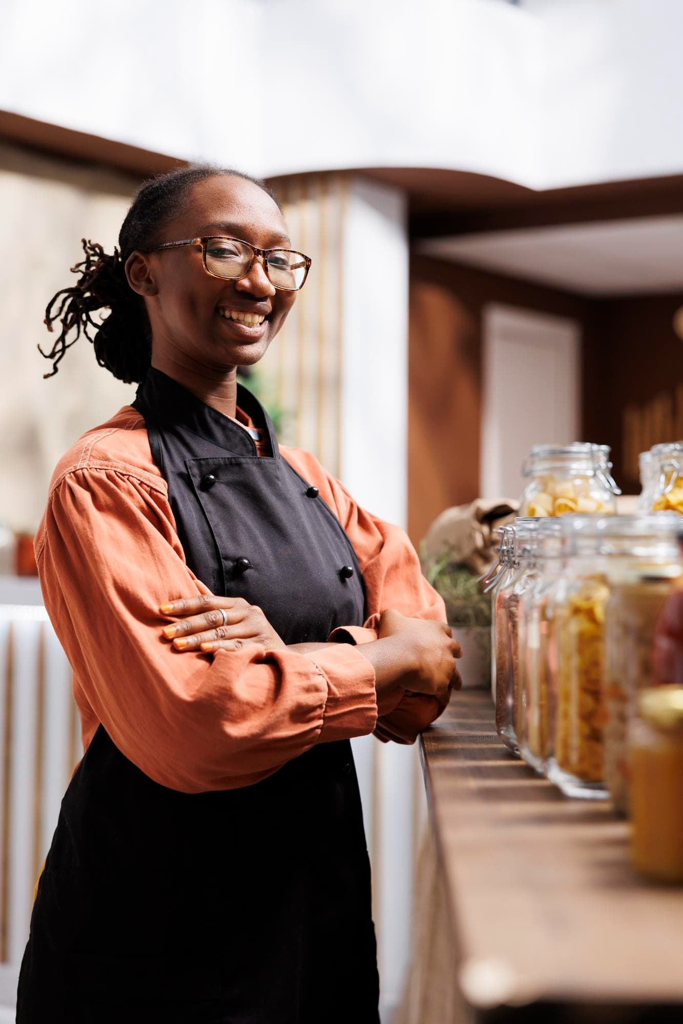 Happy small business owner running her company with peace of mind